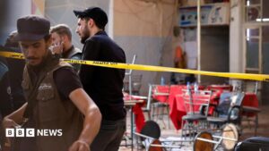 Bomb blast at central Damascus cafe kills nine, state media say
